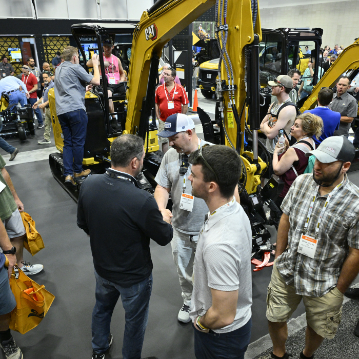 Attendee on construction simulator