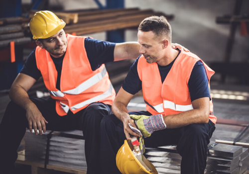 construction worker serious conversation